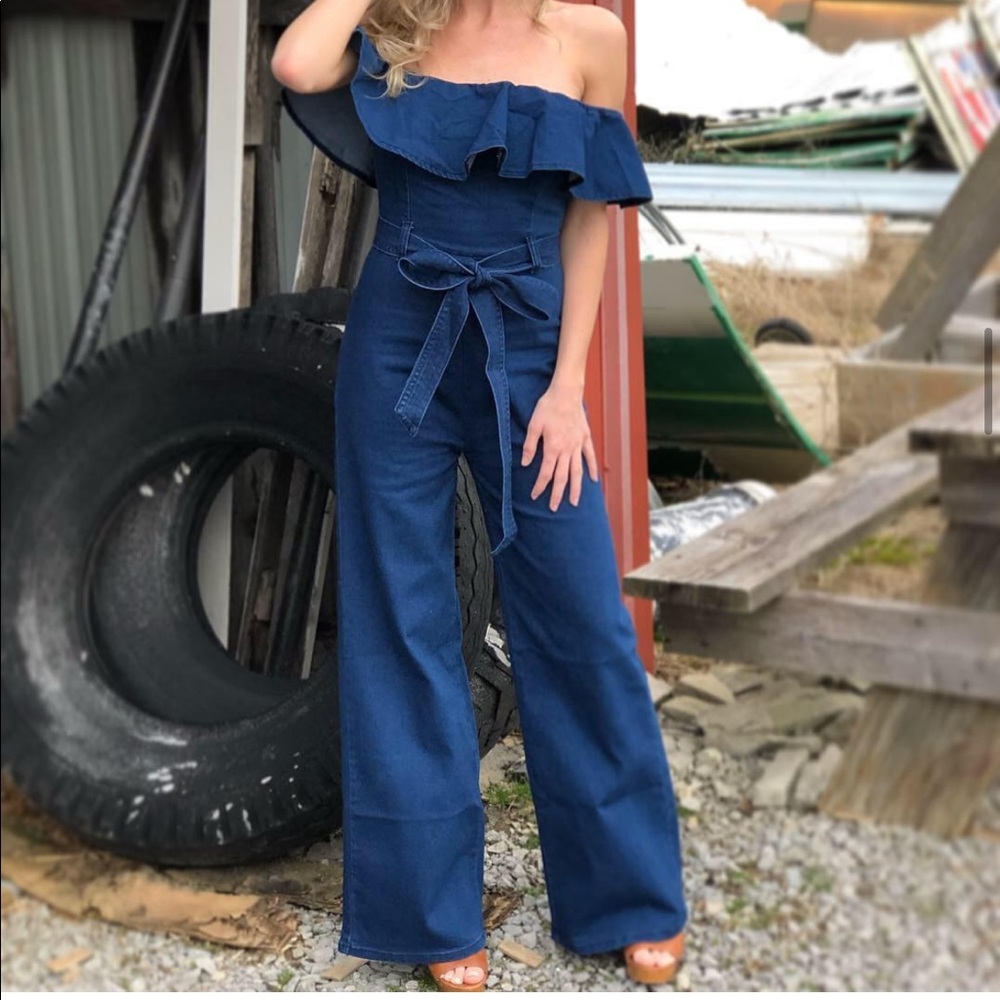 Denim jumpsuit with ruffle.